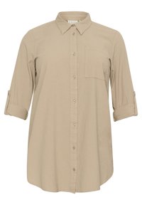 Chemise beige à boutons avec un col classique, une poche simple et des manches retroussées. Tissu doux avec une texture lisse et une coupe décontractée.