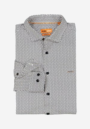 Slim-fit shirt made from fabric featuring a black and white geometric pattern. Includes a spread collar and black buttons.