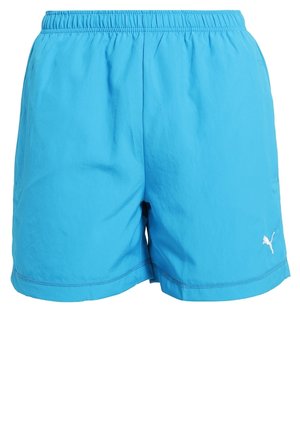 Kirkkaan siniset miesten uimashortsit, joissa on joustava vyötärönauha ja pieni valkoinen Puma-logo vasemman alaraajan alapuolella.