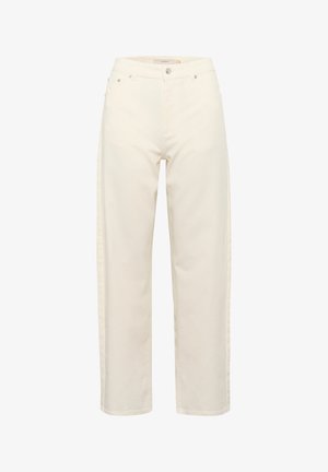 Kermanväriset leveälahkeet housut, jotka on valmistettu puuvillasta ja joissa on korkea vyötärö. Niissä on kaksi etutaskua ja vetoketjusauma.