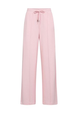 Světlé růžové široké tepláky s elastickým pasem a předním šňůrkováním, s vertikálním švem podél nohavic.