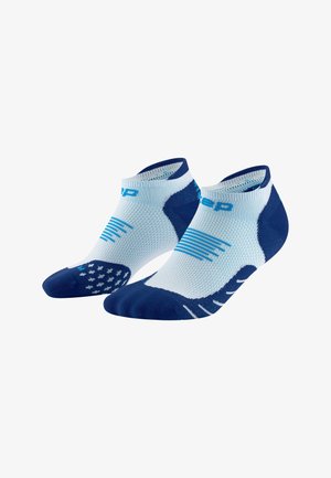 Blue and white athletic socks with a low cut design, featuring textured grips on the soles and horizontal stripe patterns on the sides.