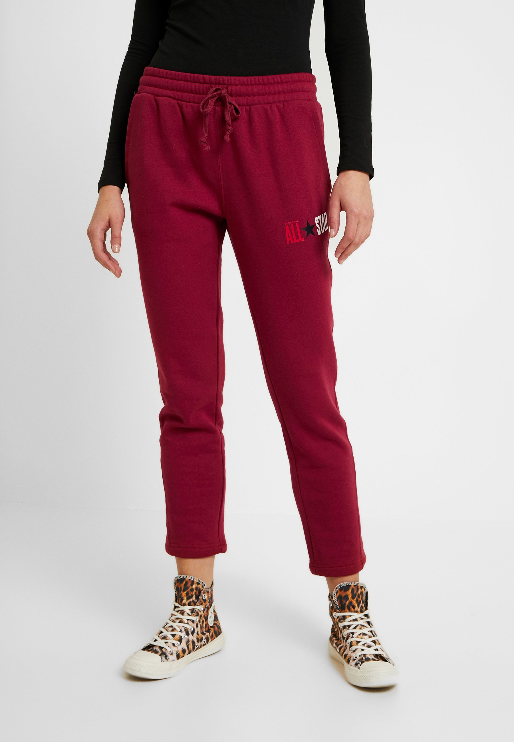 pantalon converse