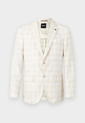 Svetlo bež blejzer z diskretnim kari vzorcem, dvema sprednjima žepoma, zapenjanjem na eno gumbe in belim naglaškom v žepu.
