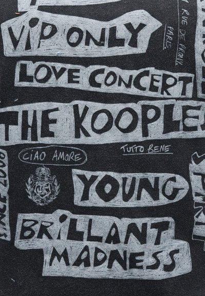 Handwritten white text on black background with phrases: "VIP ONLY," "LOVE CONCERT," "THE KOOPLE," "YOUNG," "BRILLANT MADNESS," and small emblem with "CIAO AMORE."