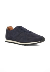 Navy suede sneakers with a rounded toe, lace-up design, contrasting white midsole, and textured black rubber outsole.
