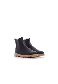 Bottines élastiques noires avec un dessus en toile lisse et des semelles en caoutchouc tan à crampons pour une bonne adhérence. Dotées de poignées pour un enfilage et un retrait faciles.