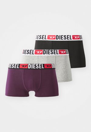 Three pairs of boxer briefs in dark purple, black, and gray. Each features a black waistband with logo accents in red and white.
