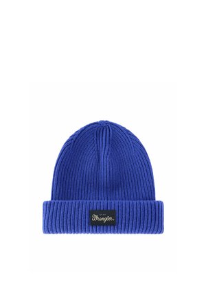Blue knitted beanie with folded cuff featuring a black rectangular label with the word Wrangler in white script letters.