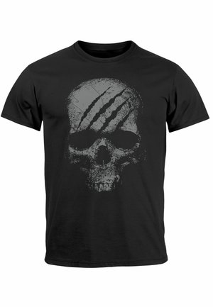 Black cotton t-shirt featuring a prominent gray skull design with scratch marks, highlighting texture and contrast. Short sleeves, crew neck.