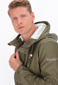 Schmuddelwedda Cappotto corto - olive