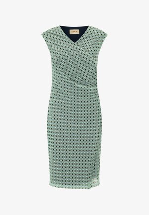 Mønstret kjole med V-hals, kortærmede ærmer og en tætsiddende silhuet. Har et geometrisk design i grønne, blå og sorte nuancer.
