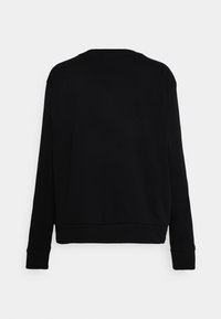 Sudadera negra de manga larga con cuello redondo, puños acanalados y dobladillo recto. Fabricada con una tela suave y lisa sin patrones.