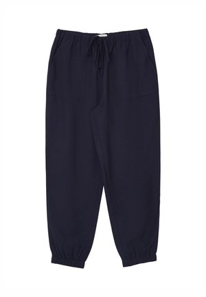 Pantaloni blu navy con vita elastica, dotati di tasche laterali e polsini arricciati, realizzati in un tessuto leggero. Dettaglio del cordoncino regolabile in vita.
