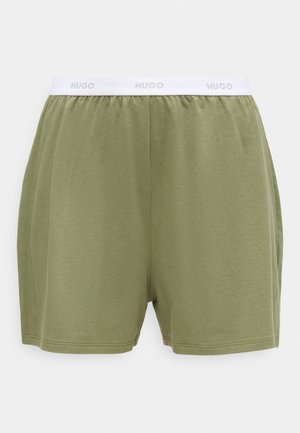 Olive green men's shorts with a white elastic waistband branded "HUGO" in light gray text.