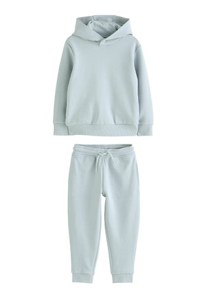 Lichtblauwe katoenen lounge-outfit bestaande uit een hoodie met een ontspannen pasvorm en joggerbroeken met een verstelbare trekkoord taille.