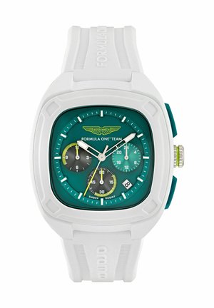 Aston Martin Forma-1 óra négyzet alakú fehér tokjával, türkiz számlapjával és három segédmérőjével. Fehér gumiszíjjal és zöld díszítésekkel rendelkezik.