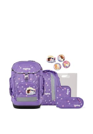 Purple ergonomic schoolbag set with pink polka dots, including backpack, smaller bag, pencil case, and horse-themed badge accessories.