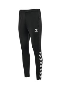 Zwarte sportbroek met een elastische tailleband, zijzakken en een wit Hummel-logo. Bevat een chevronpatroon in het wit aan de zijkant.