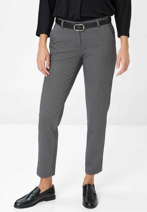 Gray and black checkered trousers with a slim fit, flat front, and subtle texture. Accentuated by a black belt with a silver buckle.