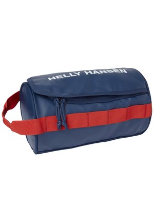 Blue cylindrical bag made of waterproof material, featuring a red strap and the text "HELLY HANSEN" in white on the front.