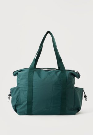 Mørkegrøn nylon-tote taske med to lange håndtag, sidelommer med snore og centralt lynlås.