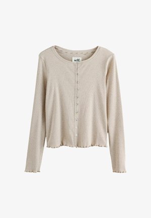 Beige langærmet cardigan lavet af ribbet stof, der har en rund halsudskæring, frontlukning med knapper og bølget kant ved kanten og ærmerne.