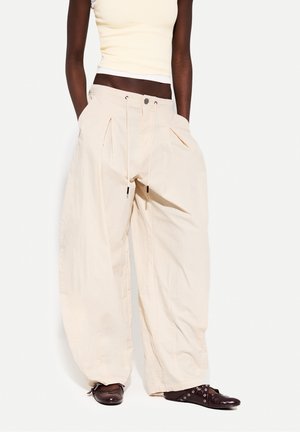 Trousers - beige