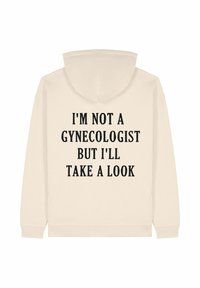 Felpa color crema con tasca frontale e cappuccio. Presenta un testo nero in grassetto sulla schiena, che riporta una frase umoristica.