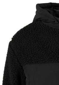 Schwarzer Hoodie mit einem strukturierten Fleece-Oberteil und einem glatten Stoffunterteil. Design mit Kapuze, das eine weiche, gemütliche Optik bietet.