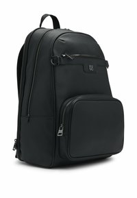 Black leather backpack with a textured finish, featuring multiple zippered compartments, a front pocket, and a logo detail.