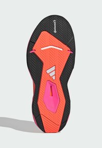 Die Außensohle des Schuhs besteht überwiegend aus schwarzem Gummi mit pinken und orangefarbenen Akzenten. Texturiertes Design mit Continental-Logo und Belüftungsschlitzen.