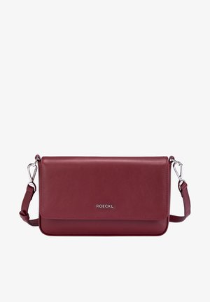 Maroon leather crossbody bag with silver hardware, a flap closure, and a detachable strap. Features a smooth texture and minimalistic design.