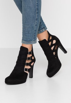 Bottines à talons hauts - black
