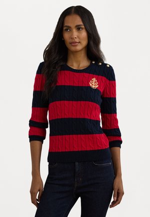 Red and navy striped cable-knit sweater with a crew neck, fitted sleeves, and gold button accents on the shoulder. Features embroidered logo.