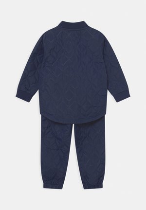 Hummel SOBI THERMO UNISEX SET - Regnbukser - dark blue