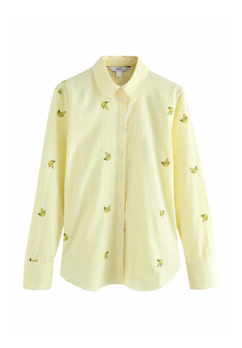 Gelb gestreiftes Hemd mit langen Ärmeln, bestickt mit schwarzen und gelben Bananen über den Stoff. Weiches Baumwollmaterial.