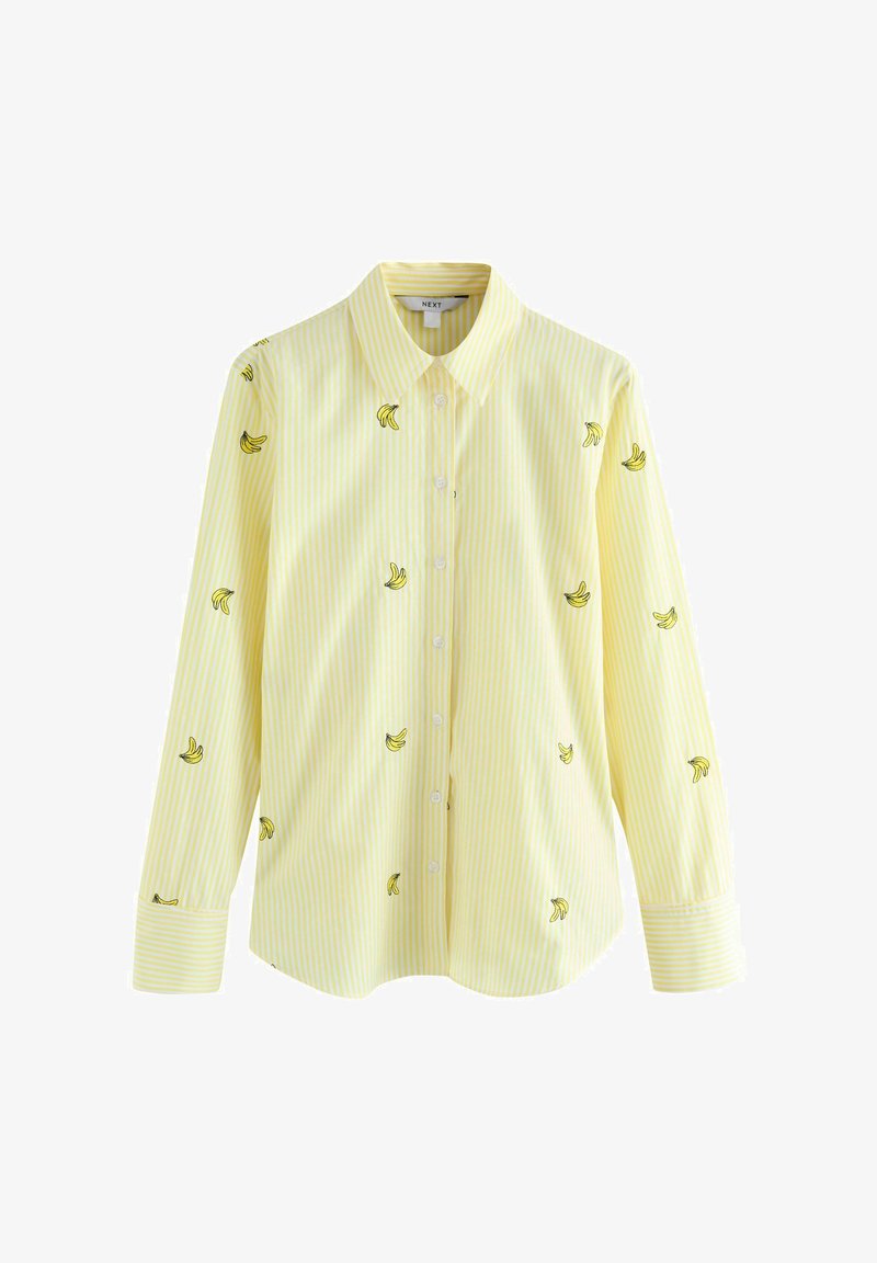 Gelb gestreiftes Hemd mit langen Ärmeln, bestickt mit schwarzen und gelben Bananen über den Stoff. Weiches Baumwollmaterial.