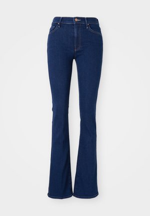 Jeans de corte acampanado en denim de algodón, de talle alto, con cinco bolsillos, detalles de costura sutil y un acabado suave.