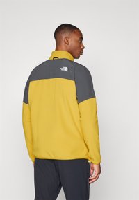 The North Face GLACIER HEAVYWEIGHT FULL ZIP - Fleece jacket - turmeric/asphalt grey/black