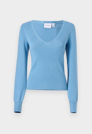 Light blue ribbed knit sweater with a V-neck, long sleeves, and fitted silhouette. Features subtle texture and cuff detailing. Brand label visible.