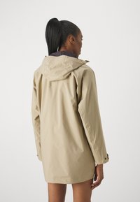 Jack Wolfskin MAINKAI - Impermeabile - sand storm