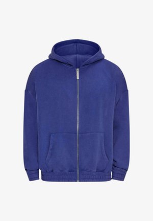 Bluza z kapturem na zamek w głębokim niebieskim kolorze, z pojemną kieszenią z przodu, elastycznymi mankietami oraz luźnym krojem.