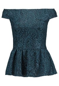 Haut péplum en dentelle bleu sarcelle foncé avec encolure bardot. Présente des motifs floraux complexes et un tissu texturé.