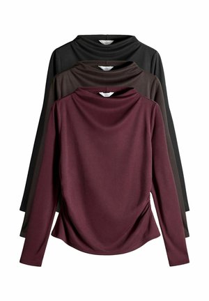 Tričko s dlhým rukávom zobrazené v stohovanej polohe: bordová vpredu, tmavohnedá a čierna. Mäkký materiál s prehnutým dizajnom a voľným strihom.