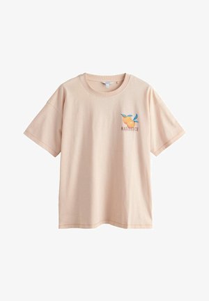 Hellbeiges Kurzarm-T-Shirt mit Rundhalsausschnitt, mit einer kleinen Grafik von zwei Orangen und dem Schriftzug "Marrakesch" auf der linken Brust.