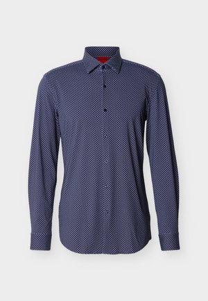 Tmavomodrá košeľa s dlhým rukávom na gombíky, s malým bielym diamantovým vzorom, z mäkkej látky, s zapínaním na gombíky na manžetách a klasickým golierom.