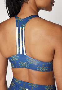 adidas Performance ADIDAS FARM RIO MEDIUM-SUPPORT - Reggiseno sportivo con sostegno medio - night indigo/dark marine/cream white