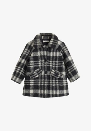 Czarnobiały wełniany płaszcz w kratę z zaokrąglonym kołnierzem, zapinany na podwójne guziki, z dwoma przednimi kieszeniami. Lekko rozkloszowany fason w kształcie litery A.