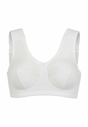 Vit bh med en texturerad blomsterdesign längs toppen, breda band, formade kupor och en slät yta. Tillverkad av lättviktigt tyg.